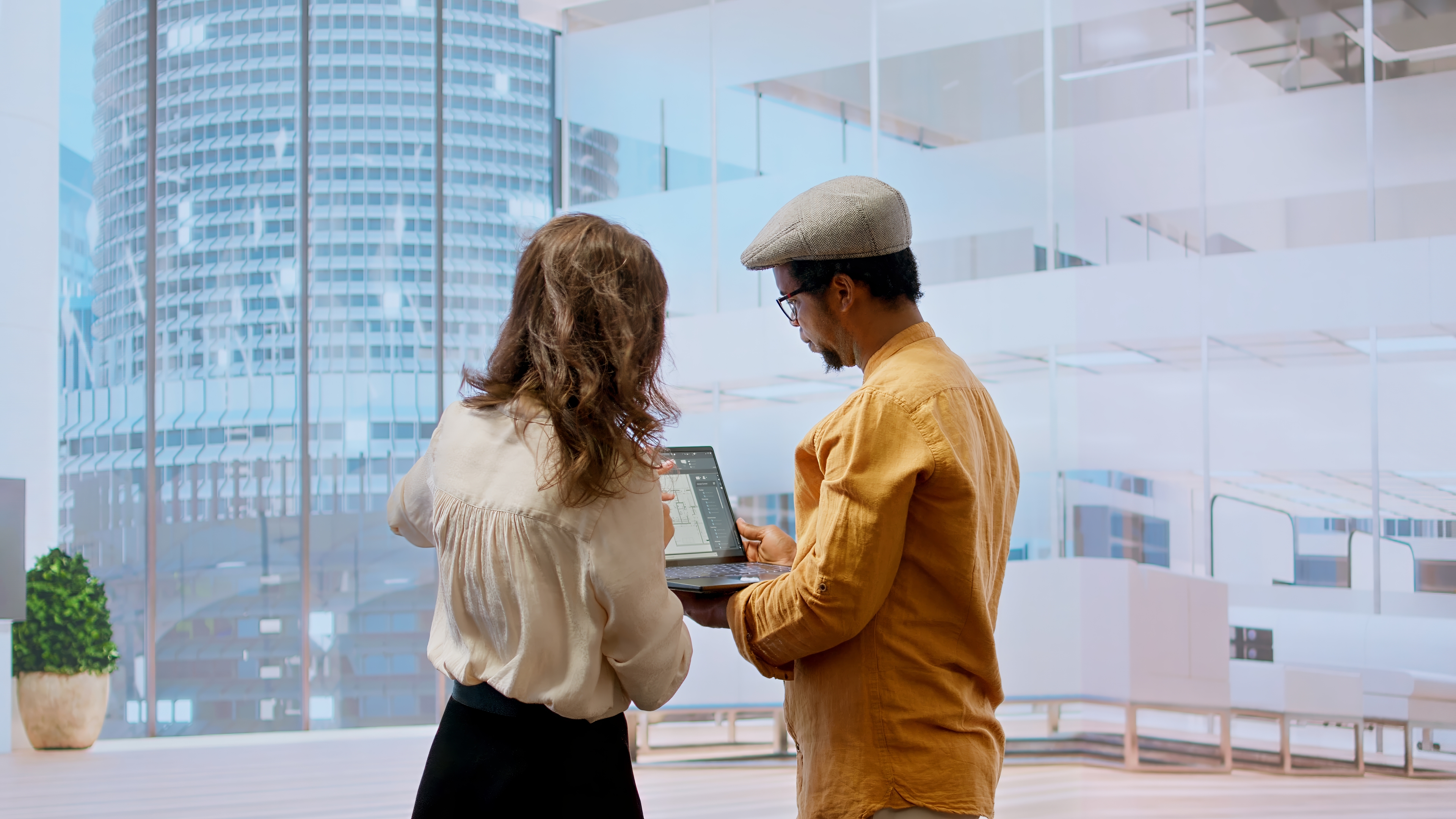 Two people discussing in an office